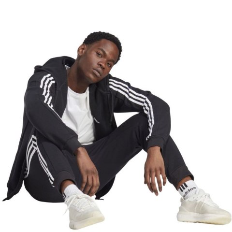 Spodnie adidas Essentials Fleece 3-Stripes Tapered Cuff M IB4030 Spodnie adidas Essentials Fleece 3-Stripes Tapered Cuff M IB4030