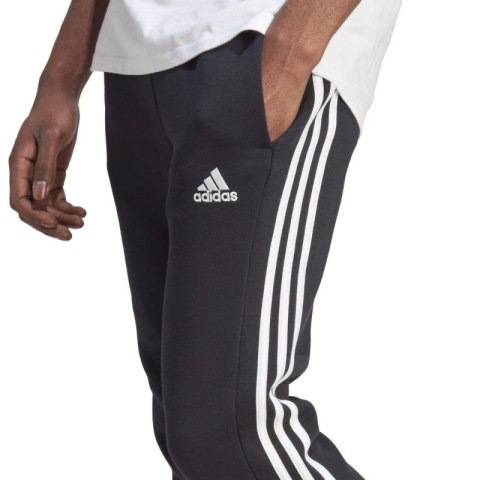 Spodnie adidas Essentials Fleece 3-Stripes Tapered Cuff M IB4030 Spodnie adidas Essentials Fleece 3-Stripes Tapered Cuff M IB4030